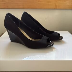 Black Bandolino size 7 peep toe wedge heels.